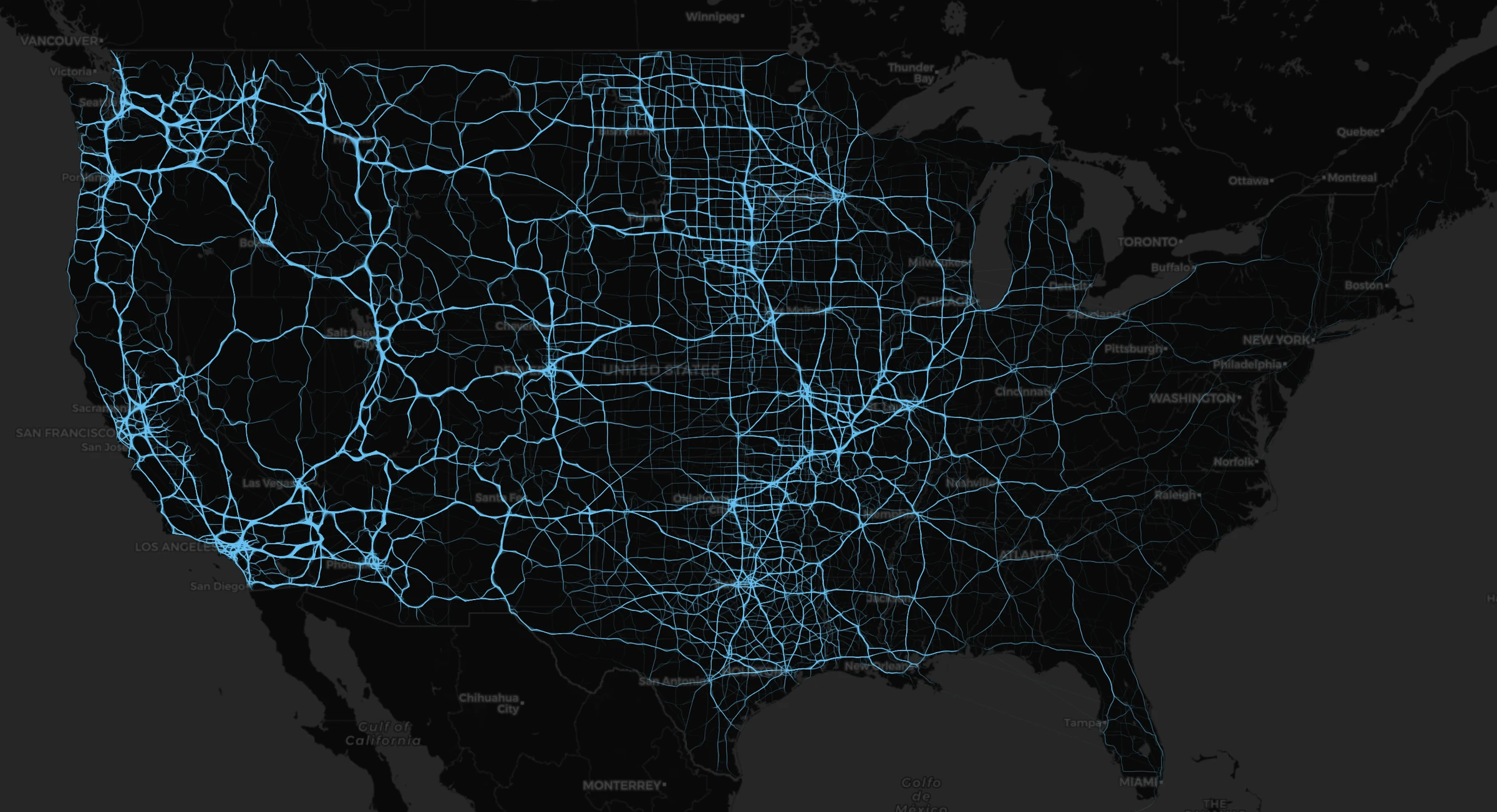 SPOT-AIS nationwide vessel trajectory layer rendered as glowing blue lines across U.S. road network